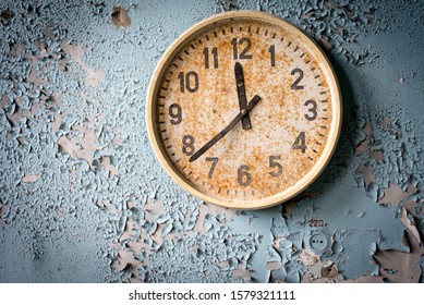 Broken Clock On A Shabby Wall