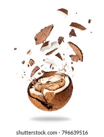 Broken coconut with of juice, isolated on white background 