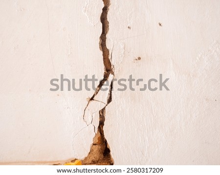 broken and collapsed wall, broken wall background, building structures damaged by earthquake affect or bad construction. Hole in wall. Texture wall pattern and crack background. Copy space for text