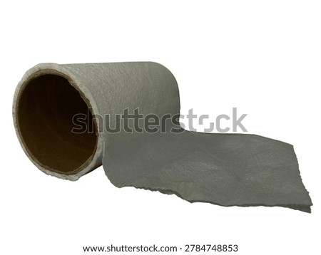 Broken concrete pipe with damaged section lying on ground