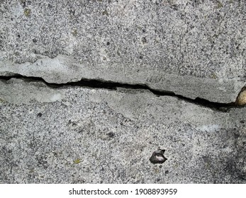 Broken Concrete Slab. Crack In Stone Material.