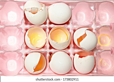 Broken Cracked Egg Shells In Pink Styrofoam Carton