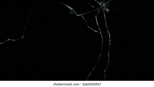 Broken Cracks Glass Fracture Effect Texture Isolated Abstract Black Background. Bullet Cracked Window With Big Hole Screen Mirror Weapon Shot.