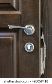 Broken Dark Wooden Door With Handle