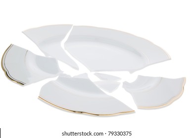 A Broken Dish Is On A White Background.