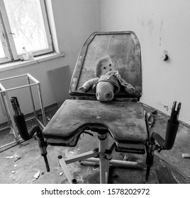 Broken Doll In An Abandoned Hospital