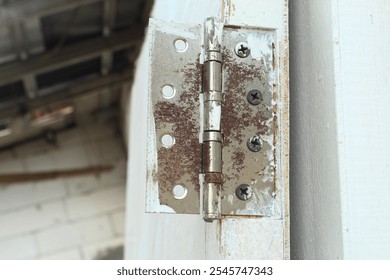 broken door hinge close up