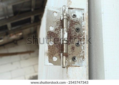 broken door hinge close up