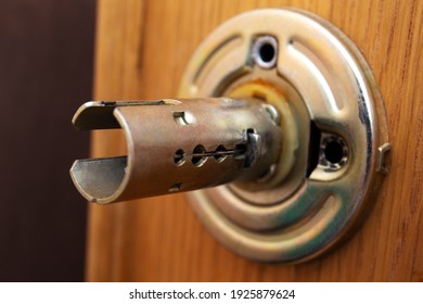 Broken door knob. Close up of a disassembled doorknob.
