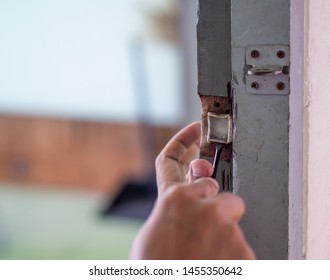 Broken Door Knob On Wooden Door