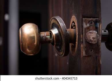 Broken Door Knob On Wooden Door