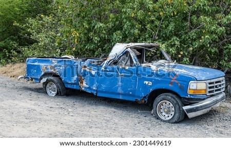 A broken down Ford truck