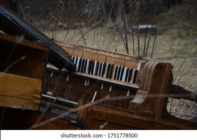 A Broken Down, Old Piano Missing Some Keys