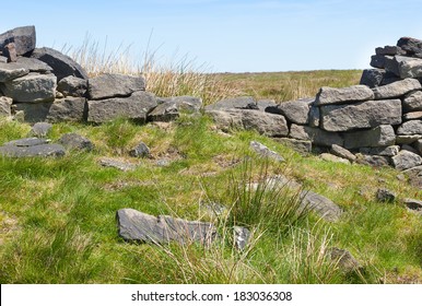 Broken Dry Stone Wall On Moorland