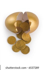 Broken Egg With Golden Coins At White Background