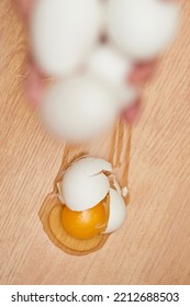 Broken Egg On The Floor In Kitchen