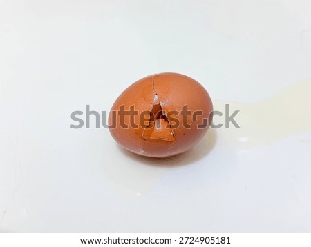 Broken Egg on White Background
