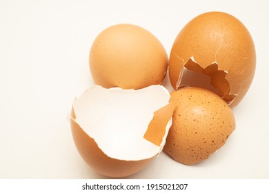 Broken Egg Shell On Warm White Background