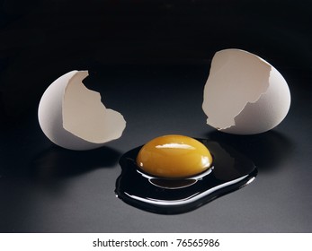 Broken Egg And Yolk.