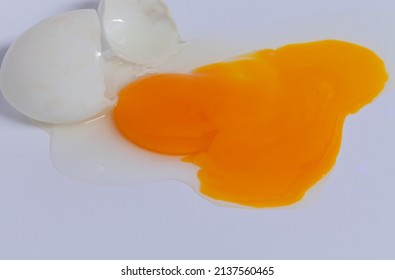 Broken Egg Yolk On Floor