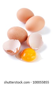 Broken Egg And Yolk, White Background