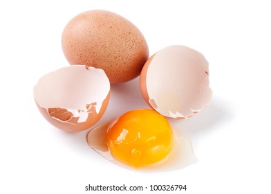 Broken Egg And Yolk, White Background