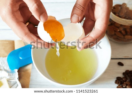 broken eggs on the table. cooking process in the kitchen
