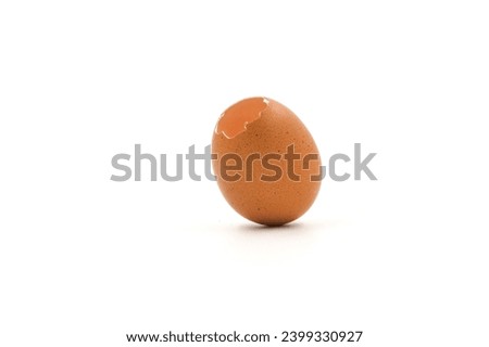 Broken eggshells on a white background