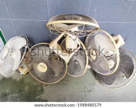 A lot of the broken fan was left on the floor which become electric waste.