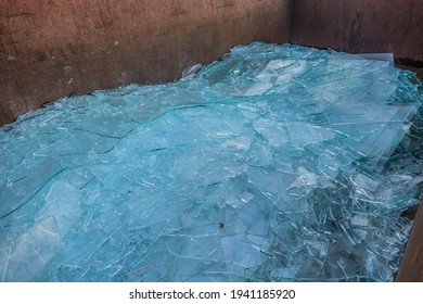 Broken Flat Glass Panes In Recyclable Container