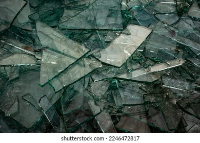 Broken flat glass panes in the recycling container