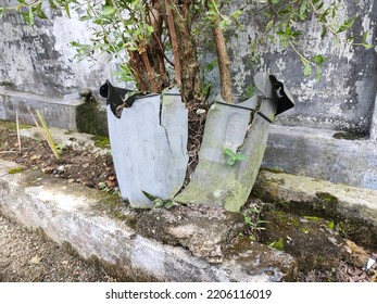 Broken Flower Pot In The Yard