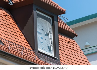 Broken Fly Screen On A Roof Window