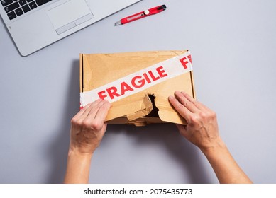 Broken Fragile Parcel, Torn Cardboard Box, Stolen Items