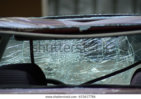Broken front window of a
car