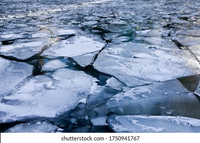 Broken Frozen Ice Over The River  