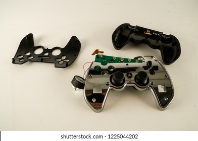 Broken Gamepad Joystick On White Backrgound