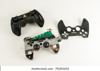 Broken Gamepad Joystick On White Backrgound