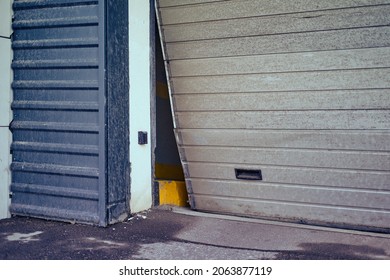 Broken Garage Door For Car Exit, Bent Door Close-up