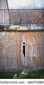 Broken Garage Door In A Rural House