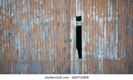 Broken Garage Door In A Rural House