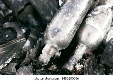 Broken Glass, Bottles After A Fire. Hard Rubbish. Environmental Pollution