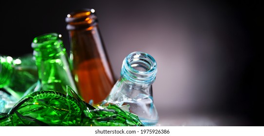 Broken Glass Bottles And Pieces Of Glass. Recycling.