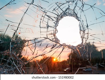 Broken Glass By The Street At Dusk