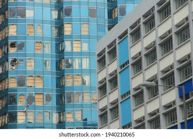 Broken Glass Of A Commercial Building In Hong Kong After Typhoon Made Landfall