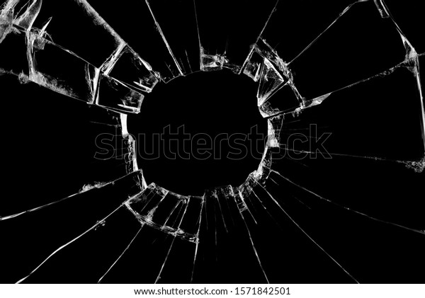 Broken glass craked on black\
background ,hi-resolution photo art abstract texture object\
design