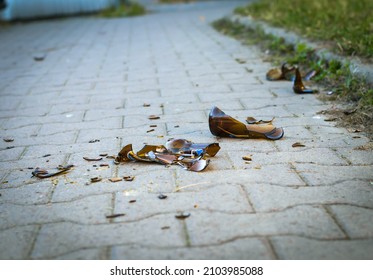 Broken Glass, A Fallen Glass Bottle On The Footpath, Sidewalk