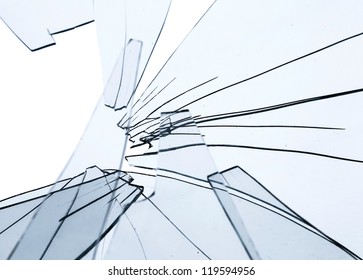 Broken Glass Fragments Above White. Abstract Background Texture