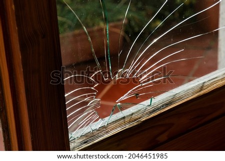broken glass front door to the house, home thieves intruding