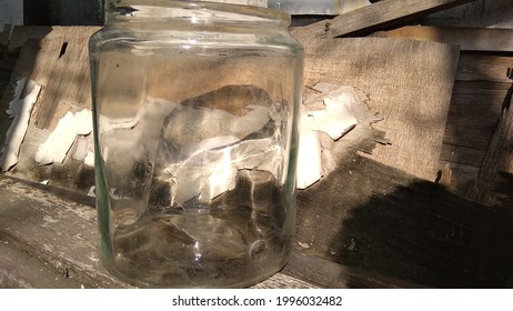 Broken Glass Jar With Hole On It